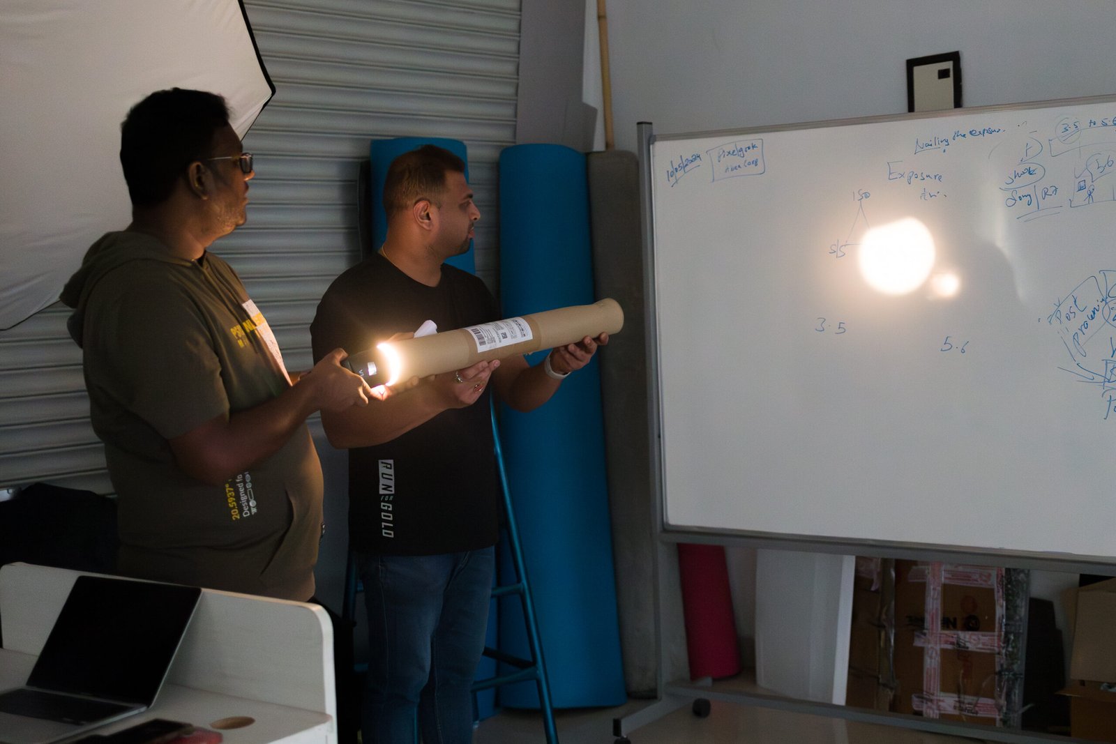 Hands-on lighting demonstration during a photography class
