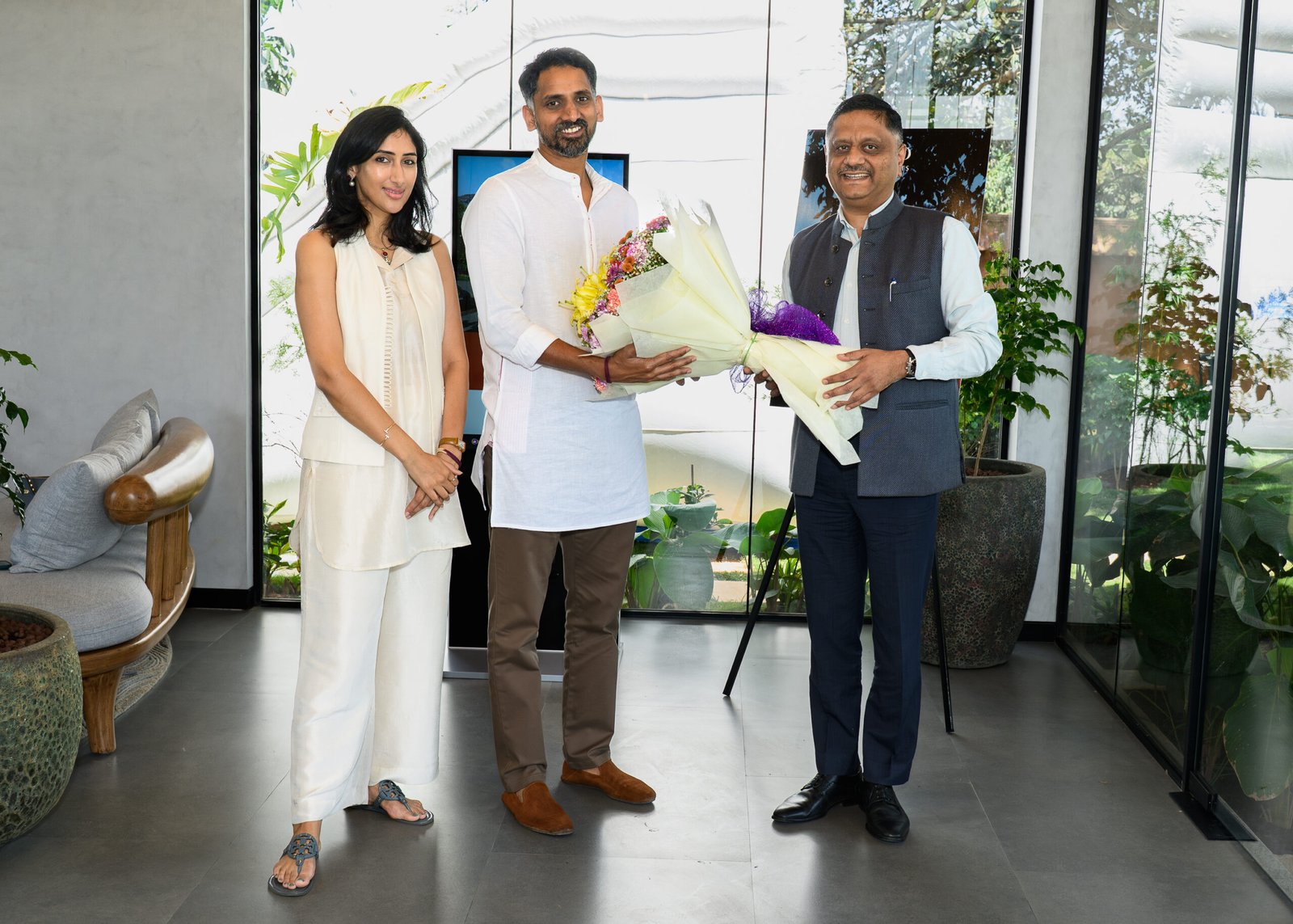 Bouquet presentation to guests during a business gathering