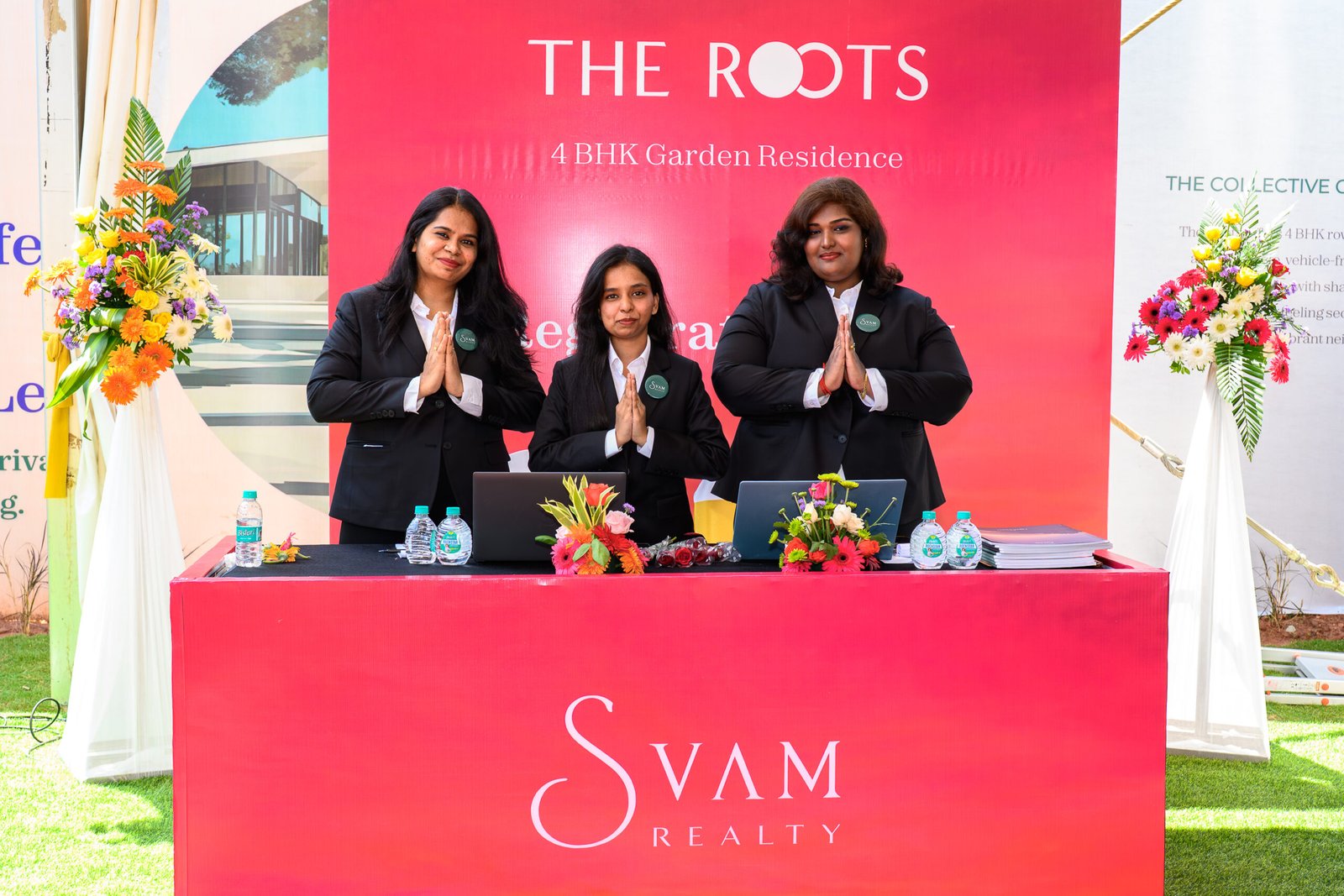 Reception team welcoming visitors at a launch event