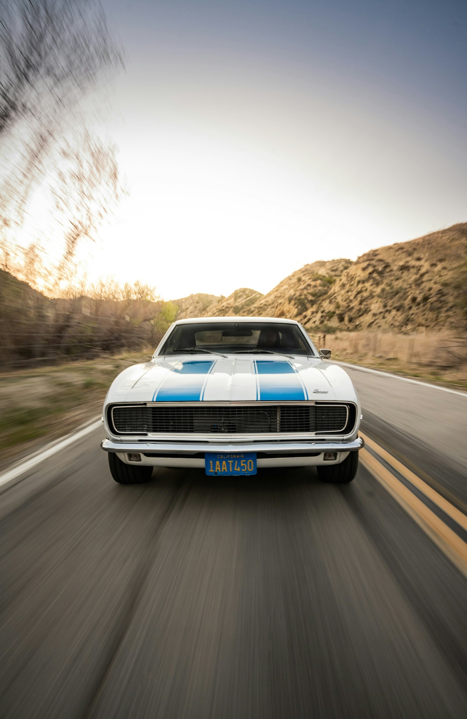 Classic muscle car on a canyon road