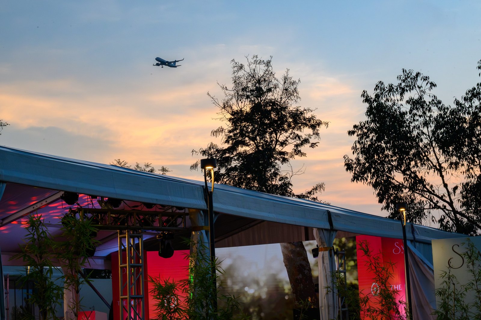 Event venue illuminated at sunset